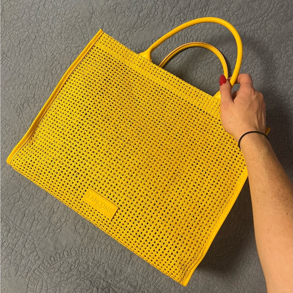 Yellow Lancôme beach bag